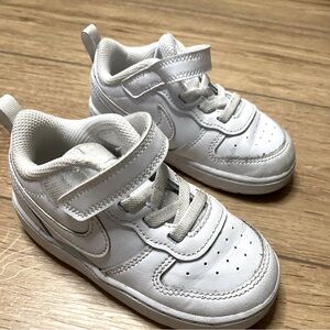 Toddler white Nike tennis shoes